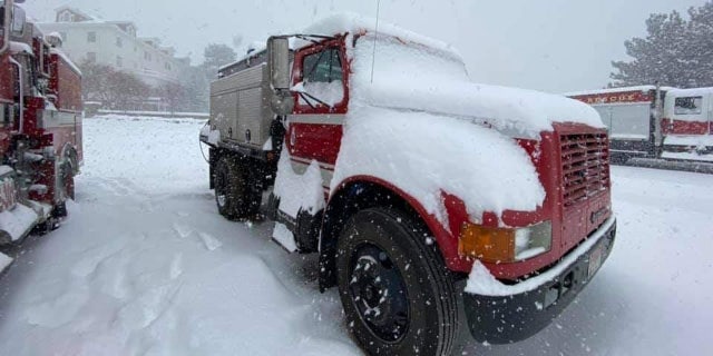 This photo released by the U.S. Forest Service shows significant snowfall near where officials have been battling the Cameron Peak Fire in Colorado.