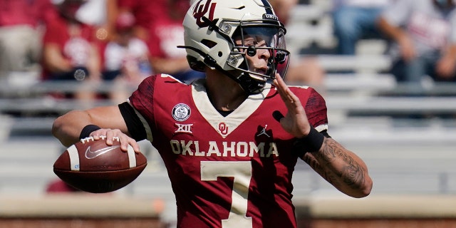 Oklahoma quarterback Spencer Rattler (7) passes in the second half of an NCAA college football game against Kansas State Saturday, Sept. 26, 2020, in Norman, Okla. (AP Photo/Sue Ogrocki).