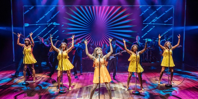 This image released by Polk &amp; Co. shows Adrienne Warren, center, during a performance of "Tina: The Tina Turner Musical." Nominations for Tony Awards will be announced Thursday with just 18 eligible plays and musicals making the cut, a fraction of the 34 shows the season before.