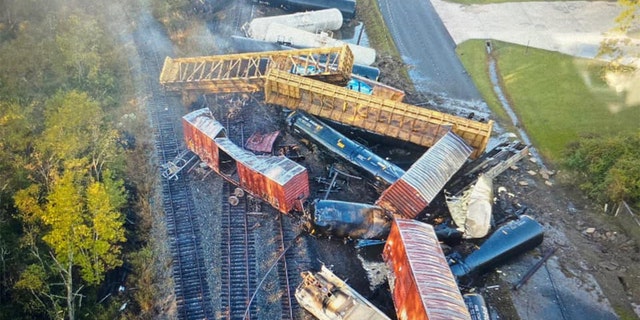 Aerial photos of the crash show a mangled pileup of train cars, some of them torn apart and others flipped upside-down or on their sides.