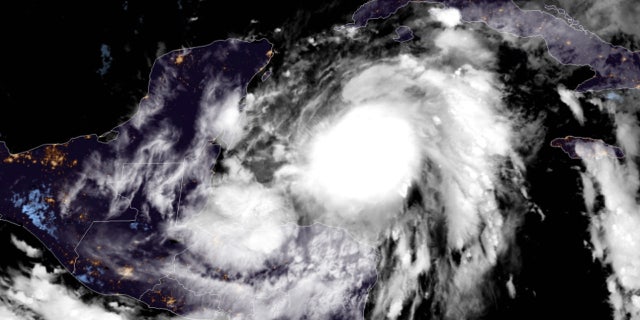 Tropical Storm Zeta is strengthening Monday as the storm approaches Mexico's Yucatan Peninsula.