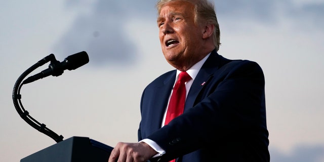 President Trump speaks during a campaign rally at Orlando Sanford International Airport, Oct. 12, 2020, in Sanford, Fla. (AP Photo/Evan Vucci)