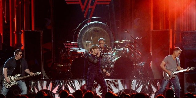 Left to right: Wolfgang Van Halen, David Lee Roth, Alex Van Halen and Eddie Van Halen of Van Halen perform during the 2015 Billboard Music Awards at MGM Grand Garden Arena on May 17, 2015 in Las Vegas, Nevada. (Photo by Ethan Miller/Getty Images)