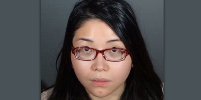 Mugshot for Andrea Dorothy Chan Reyes, 35.