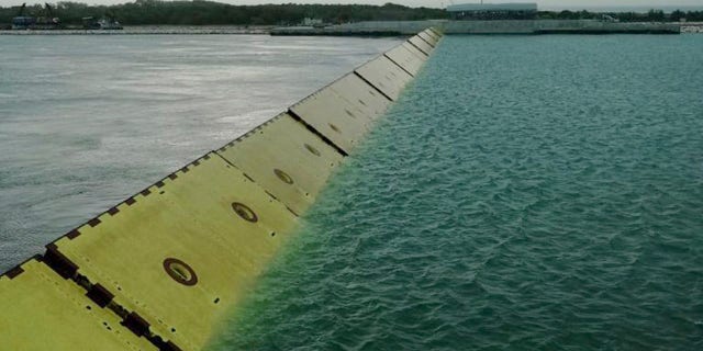 Barriers are raised during high water in Venice, northern Italy, Saturday, Oct. 3, 2020.