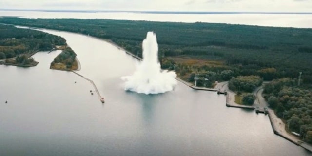 A British World War II bomb exploded while being made safe underwater by navy demolition specialists in northwestern Poland on Tuesday.