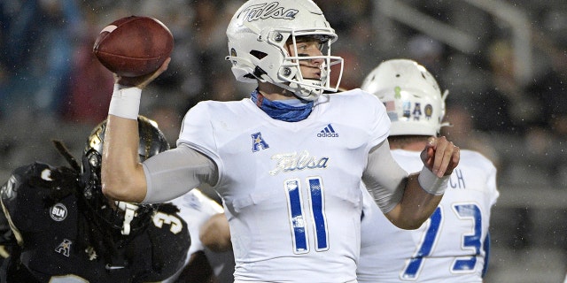 Tulsa quarterback Zach Smith (11) throws a pass in front of Central Florida defensive back Antwan Collier (3) during the first half of an NCAA college football game Saturday, Oct. 3, 2020, in Orlando, Fla. (AP Photo/Phelan M. Ebenhack)