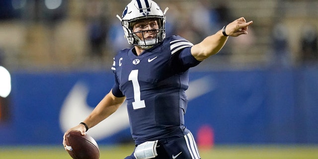 BYU quarterback Zach Wilson (1) looks downfield in the first half during an NCAA college football game against Texas State Saturday, Oct. 24, 2020, in Provo, Utah. (AP Photo/Rick Bowmer)