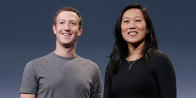 Facebook CEO Mark Zuckerberg and his wife Priscilla Chan