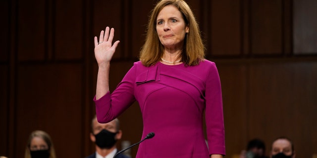 Supreme Court nominee Amy Coney Barrett is sworn in during a confirmation hearing before the Senate Judiciary Committee, Monday, Oct. 12, 2020, on Capitol Hill. (AP Photo/Patrick Semansky, Pool)