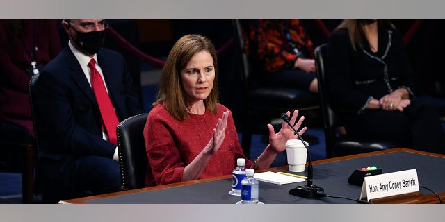 Supreme Court nominee Amy Coney Barrett speaks during a confirmation hearing before the Senate Judiciary Committee, Tuesday, Oct. 13, 2020, on Capitol Hill in Washington. (Kevin Dietsch/Pool via AP)