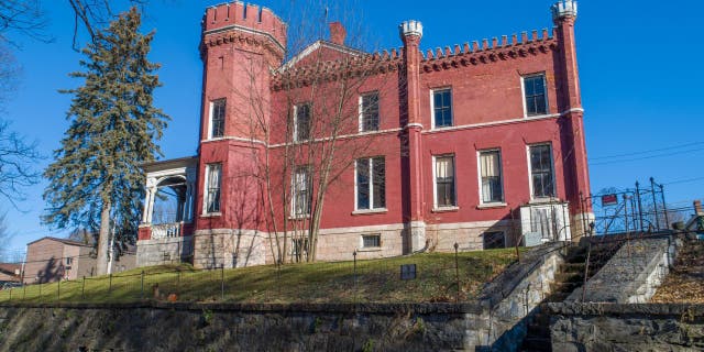 The brick home encompasses about 7,000 square feet across three stories. (Michael DeRosa / Michael DeRosa Exchange, LLC)