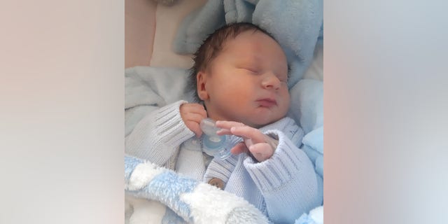 Surprise! Little Alfie Sexton was born on Sept. 20.