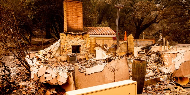 A chimney stands at a Fairwinds Estate Winery building, which burned in the Glass Fire, on Thursday, Oct. 1, 2020, in Calistoga, Calif.
