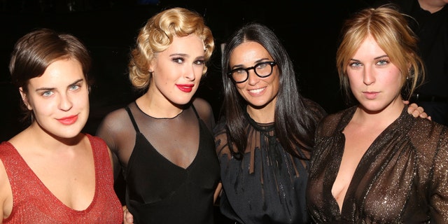 Rumer Willis, second from left, appears with sister Talullah Willis, left, mother Demi Moore, center, and sister Scout Willis, right. (Photo by Bruce Glikas/FilmMagic)