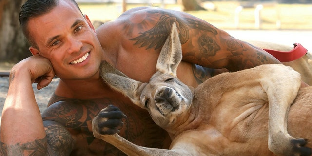 MIck, seen here with Jack the kangaroo, is one of many firefighters featured in one of the 2021 editions.