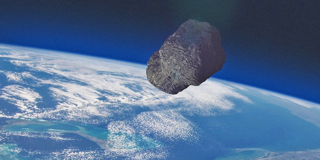An asteroid over Earth