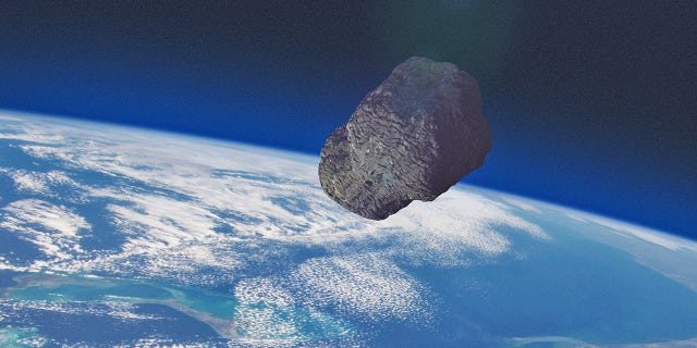 An asteroid over Earth