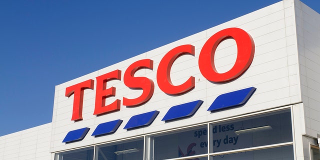 Edinburgh, Scotland, UK - 21st March 2011: Front entrance sign of a Tesco Superstore supermarket at the Hermiston Gait Retail Park in Edinburgh. Tesco divide their UK stores into six categories, with superstores such as this one being classed as a large supermarket.