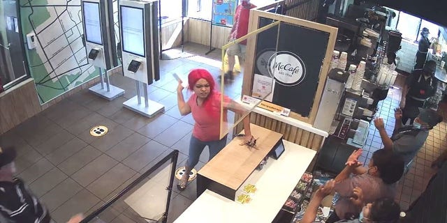 The woman yelled and threw objects at employees.