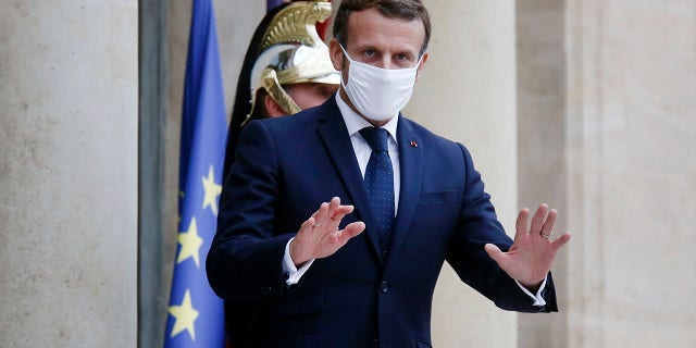 French President Emmanuel Macron was expected to announce new restrictions during a planned televised evening address to the nation later Wednesday. (AP Photo/Thibault Camus)