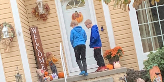 Eli Rempe and Sam Yarpe, pictured, returned Mallory Pittman-Morris' lost handbag to her home last weekend.