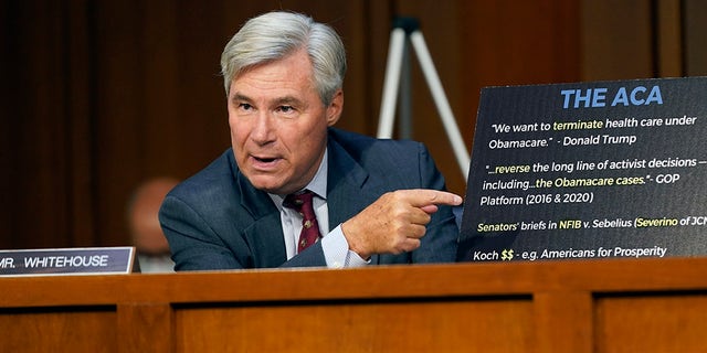 Sen. Sheldon Whitehouse, D-R.I., speaks during the confirmation hearing for Supreme Court nominee Amy Coney Barrett before the Senate Judiciary Committee, Tuesday, Oct. 13, 2020, on Capitol Hill in Washington. (AP Photo/Patrick Semansky)