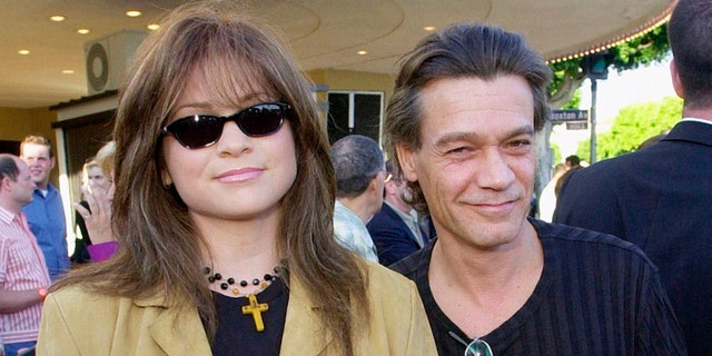 Valerie Bertinelli, left, arrives at the premiere of the film "America's Sweethearts" with husband Eddie Van Halen in Los Angeles on July 17, 2001. (Associated Press)