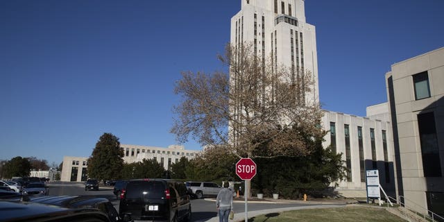 The motorcade of President Donald Trump waits at Walter Reed National Military Medical Center, Saturday, Nov. 16, 2019, in Bethesda, Md. (AP Photo/Manuel Balce Ceneta)