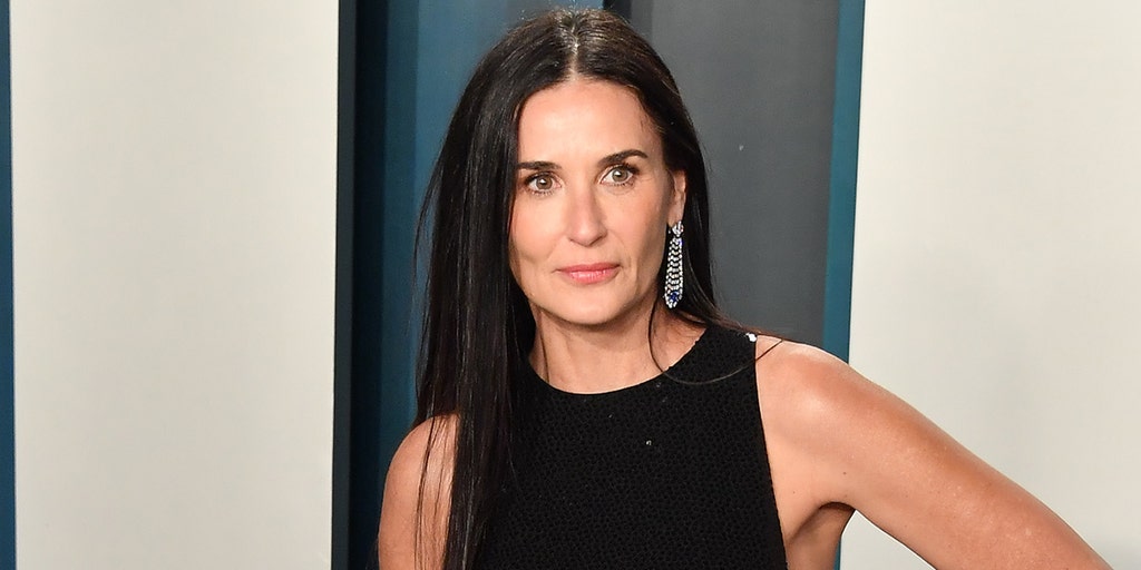 Demi Moore, 57, stuns in fishnets, black lace at Rihanna's Savage X Fenty  lingerie fashion show