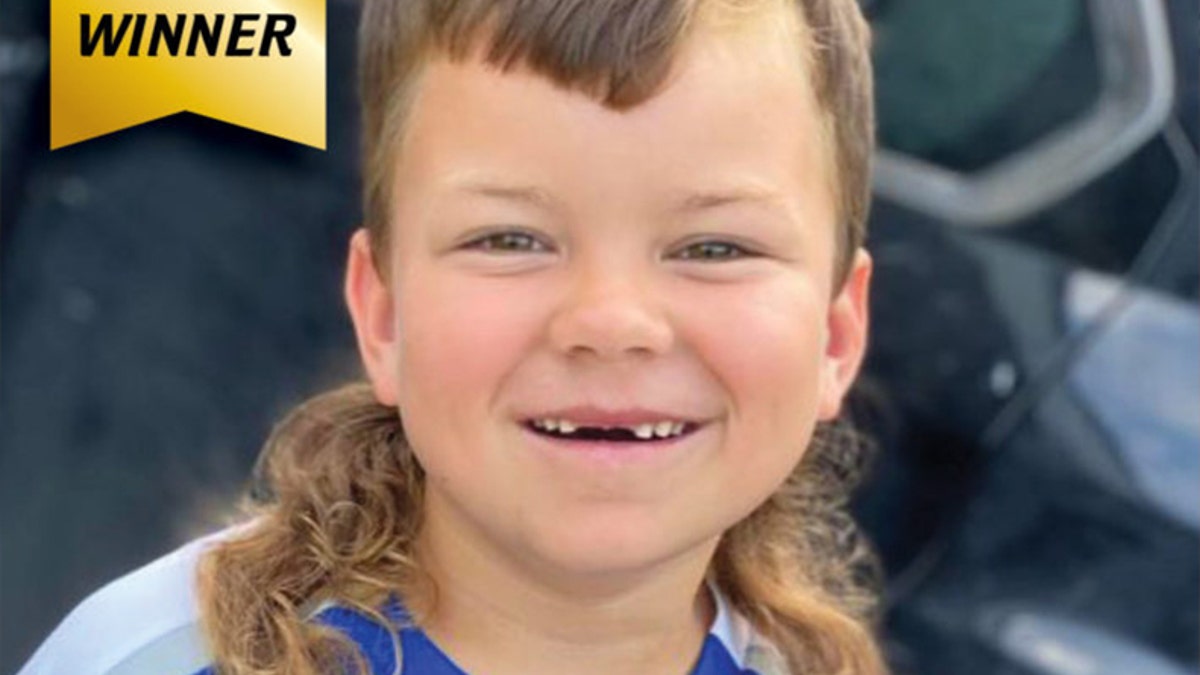 8-year-old Jax from Texas took first prize in the 2020 Kids Mullet Championships.