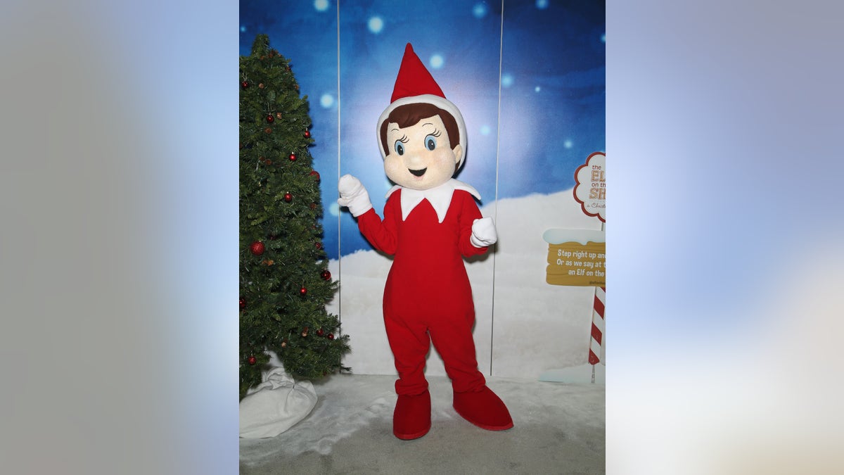 A model dressed as The Elf on the Shelf at a Las Vegas convention in 2016.