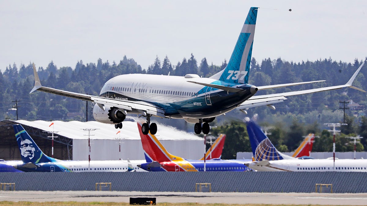 Boeing expects to deliver about half of the aircraft currently in storage by the end of next year and most of the rest in the year after. (AP Photo/Elaine Thompson)