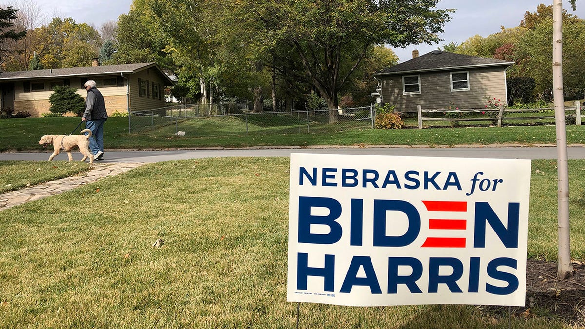 A Joe Biden presidential campaign sign greets passersby in a leafy neighborhood of Omaha, Neb., Monday, Oct. 19, 2020. (Associated Press)