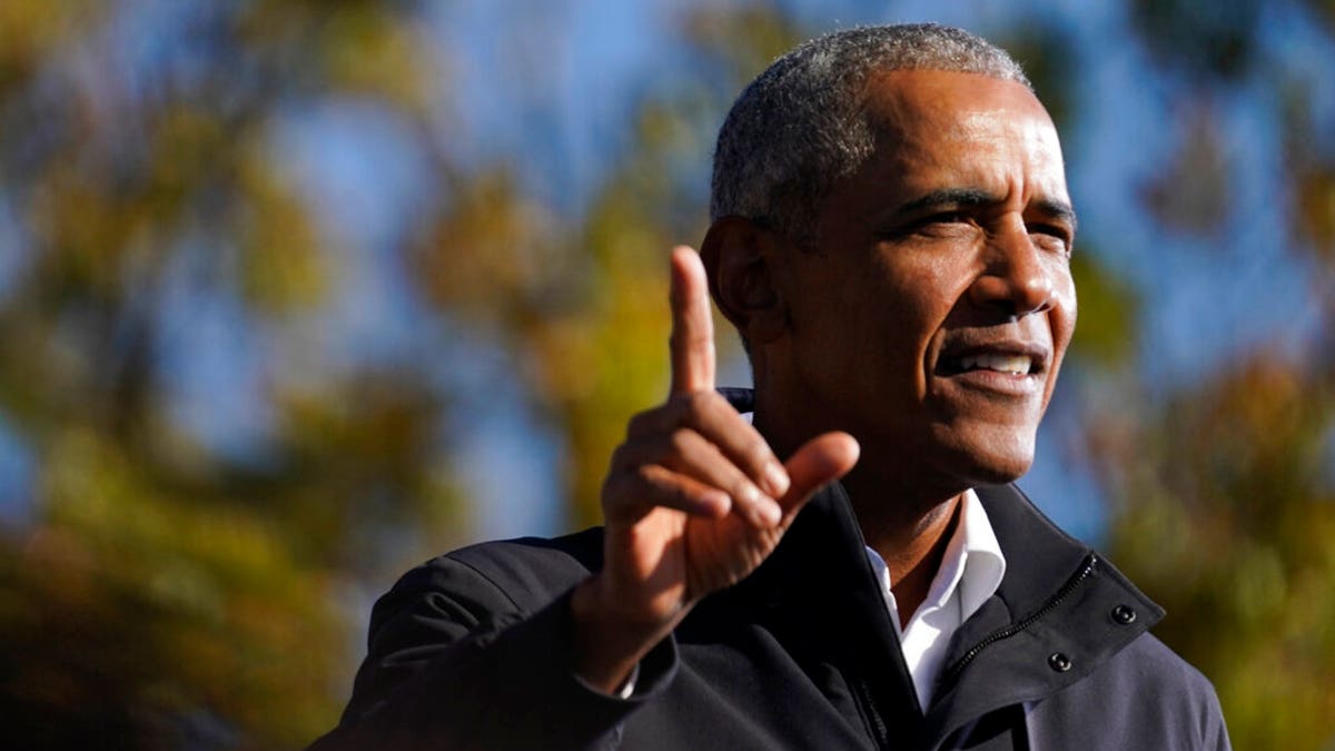 Former President Barack Obama speaks at a rally as he campaigns for Democratic presidential candidate former Vice President Joe Biden, Monday, Nov. 2, 2020, at Turner Field in Atlanta.
