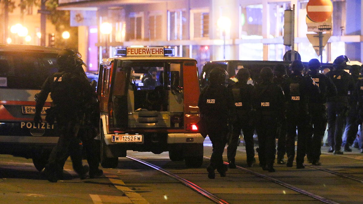 Police officers walk at the scene after gunshots were heard, in Vienna, Nov. 2. Austrian police say several people have been injured and officers are out in force following gunfire in the capital Vienna. Initial reports that a synagogue was the target of an attack couldn't immediately be confirmed. Austrian news agency APA quoted the country's Interior Ministry saying one attacker has been killed and another could be on the run.(Photo/Ronald Zak)