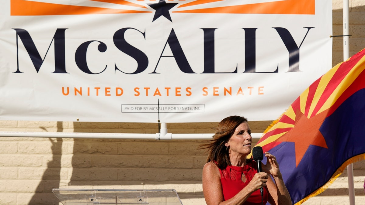 Arizona Republican Sen. Martha McSally campaigns at Republican Party Headquarters Monday, Nov. 2, 2020, in Phoenix. (AP Photo/Ross D. Franklin)