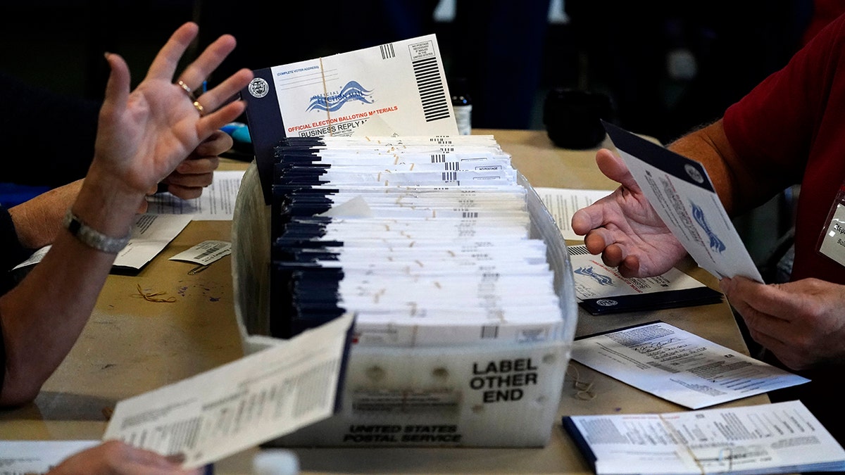 Chester County, Pennsylvania, election workers process mail-in and absentee ballots for the 2020 presidential election at West Chester University, Nov. 4, 2020, in West Chester, Pennsylvania. (Associated Press)