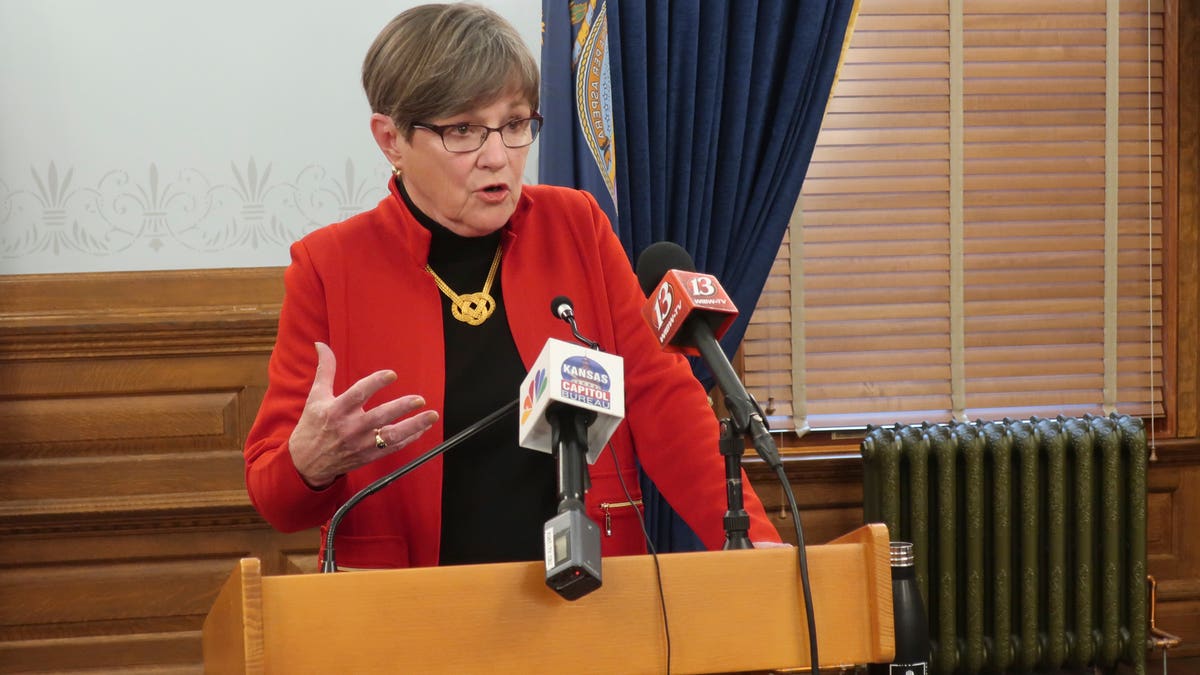 Kansas Gov. Laura Kelly speaks to reporters during a Statehouse news conference in Topeka, Kan. Democratic Party leaders want to oust Democratic state Rep.-elect Aaron Coleman, D-Kansas City, over a tweet he made criticizing the governor that they view as threatening. Coleman admitted to circulating revenge porn and was charged at the age of 14 with threatening to shoot a high school student. (AP Photo/John Hanna)