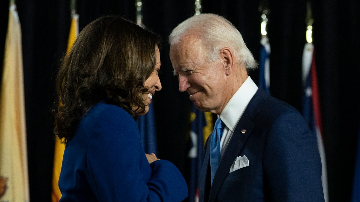 Joe Biden and Kamala Harris during a campaign event on Aug. 12, 2020, at Alexis Dupont High School in Wilmington, Delaware. (AP Photo/Carolyn Kaster, File)