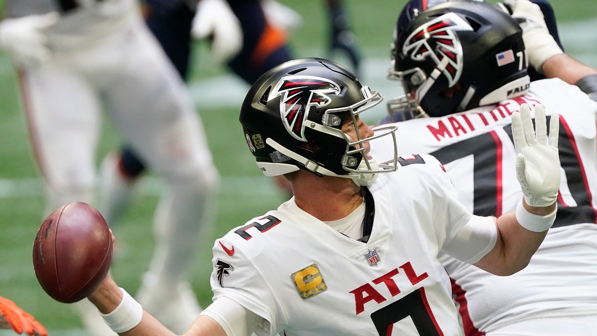 Atlanta Falcons quarterback Matt Ryan (2) works in the pocket during the second half of an NFL football game against the Denver Broncos, Sunday, Nov. 8, 2020, in Atlanta. (AP Photo/John Bazemore)