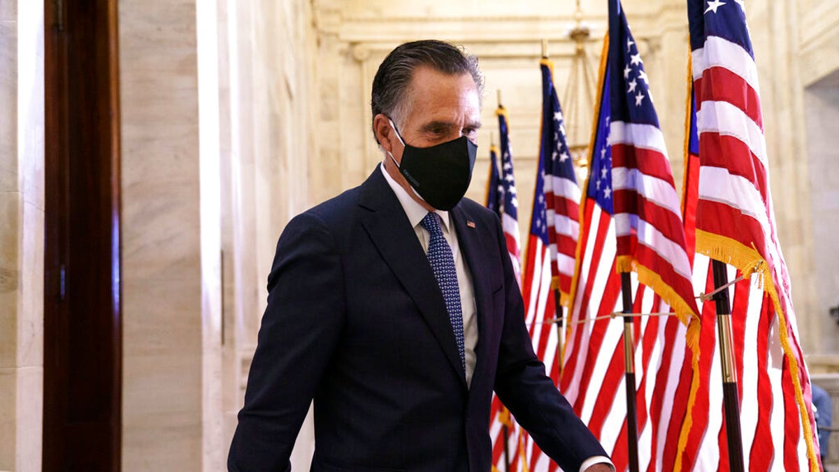 Sen. Mitt Romney, R-Utah, departs after the Republican Conference held leadership elections, on Capitol Hill in Washington, D.C., on Nov. 10, 2020. (AP Photo/J. Scott Applewhite)