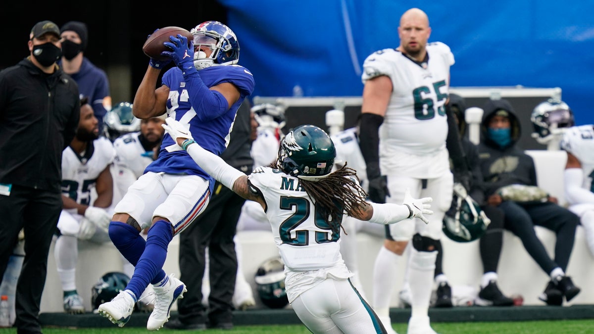 New York Giants' Sterling Shepard (87) catches a pass in front of Philadelphia Eagles' Avonte Maddox (29) during the second half of an NFL football game Sunday, Nov. 15, 2020, in East Rutherford, N.J.