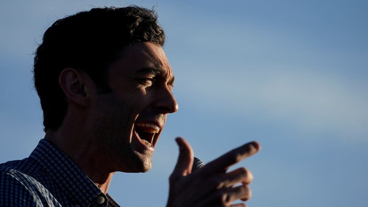 Georgia Democratic candidate for U.S. Senate Jon Ossoff speaks during a rally on Sunday, Nov. 15, 2020, in Marietta, Ga. Ossoff and Republican candidate for Senate Sen. David Perdue are in a runoff election for the Senate seat. (AP Photo/Brynn Anderson)