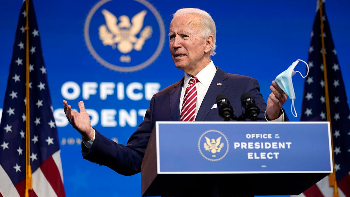 President-elect Joe Biden, accompanied by Vice President-elect Kamala Harris, speaks about economic recovery at The Queen theater, Monday, Nov. 16, 2020, in Wilmington, Del. (AP Photo/Andrew Harnik)