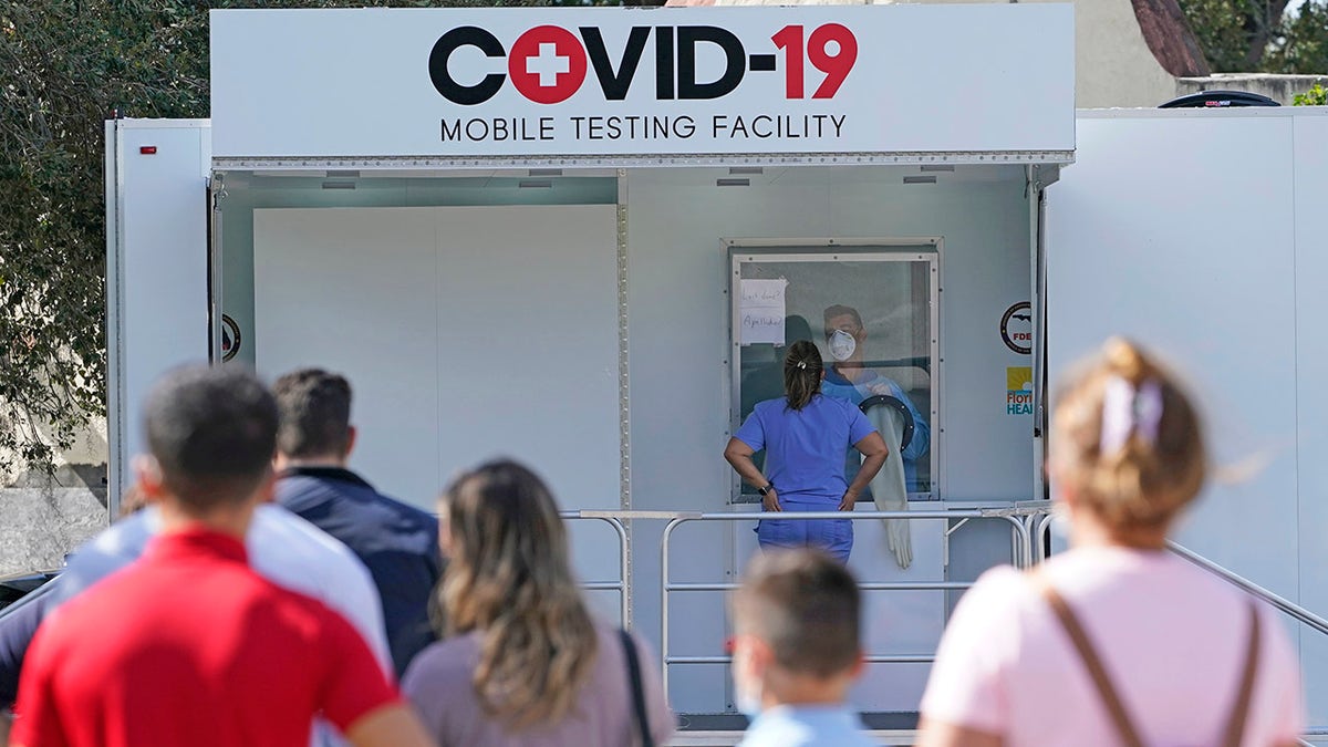 People lined up to receive a COVID test