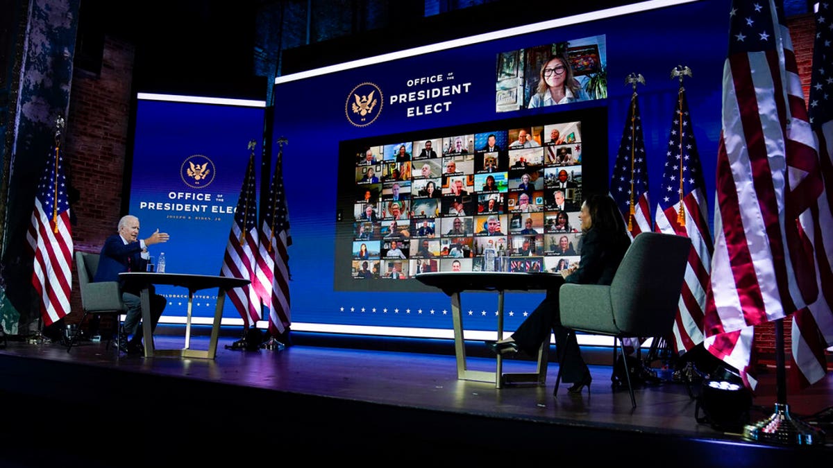 President-elect Joe Biden and Vice President-elect Kamala Harris attend a meeting at The Queen theater Monday, Nov. 23, 2020, in Wilmington, Del. (AP Photo/Carolyn Kaster)