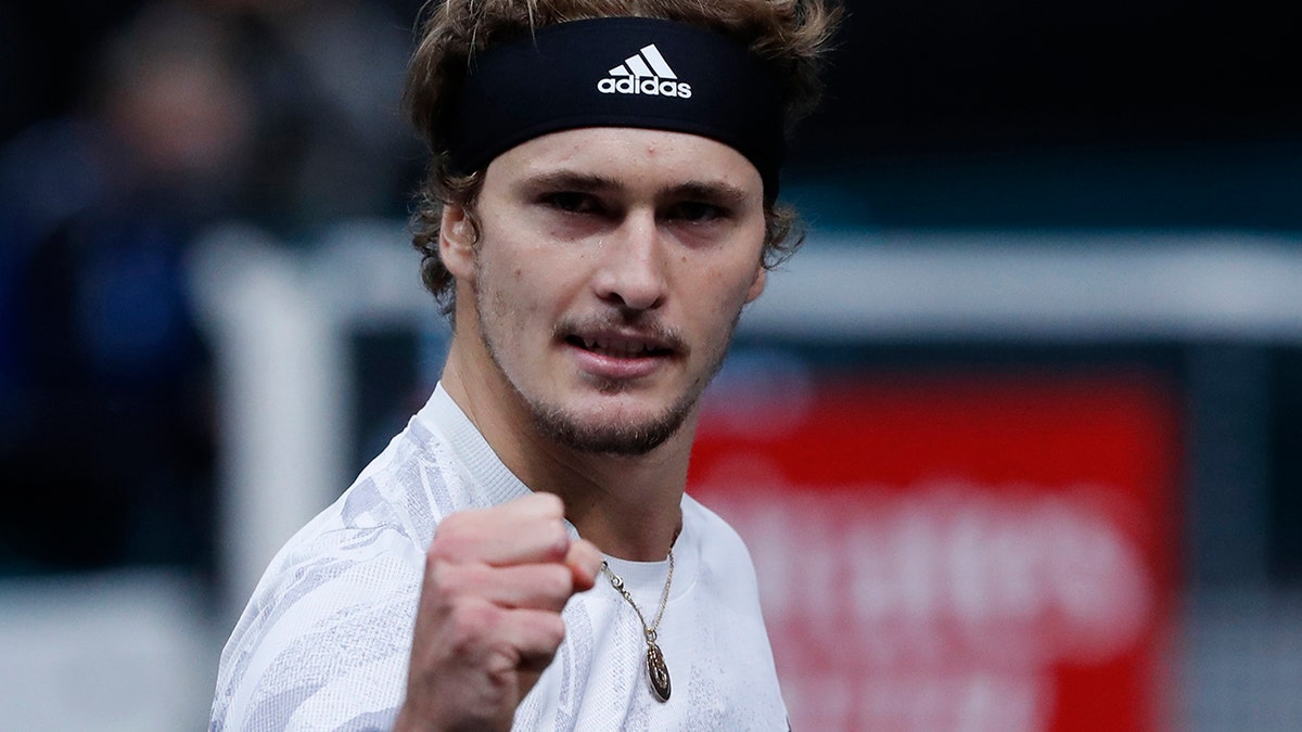 Germany's Alexander Zverev reacts after winning his semi-final game against Spain's Rafael Nadal at the Paris Masters tennis tournament in Paris, Saturday, Nov. 7, 2020. (AP Photo/Thibault Camus)