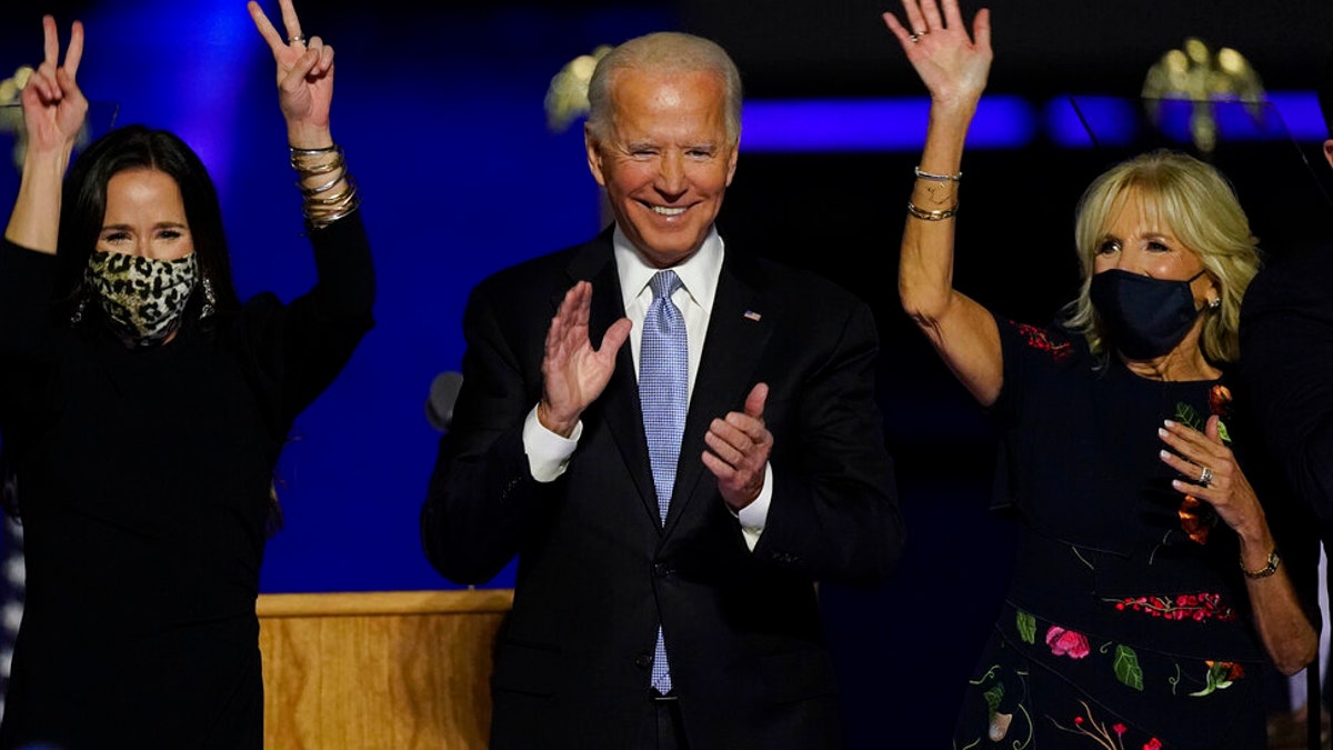 President-elect Joe Biden, seen here with wife Jill Biden and daughter Ashley Biden, has inspired a new burger at a Japanese restaurant located near a U.S. naval base. (AP Photo/Andrew Harnik)