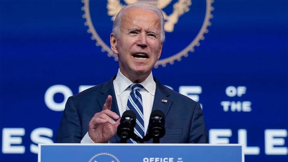 President-elect Joe Biden speaks at The Queen theater, Tuesday, Nov. 10, 2020, in Wilmington, Del. Biden leads in Georgia by about 14,000 votes as a recount gets underway in earnest Friday. (AP Photo/Carolyn Kaster)